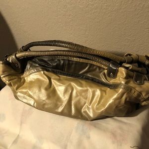 Woman’s purse brown and gold. Unique style.